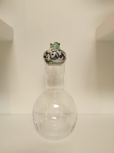 Glass Bottle with Pomegrante Cover